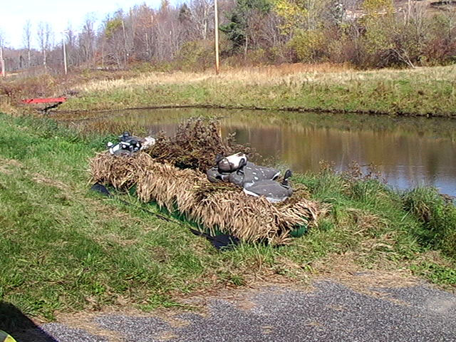 camouflaged duck hunting kayak