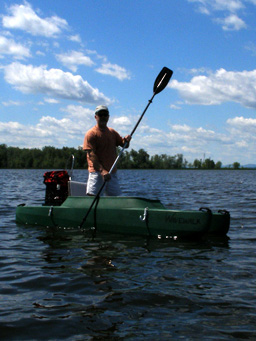 Dan fishing standing in his kayak