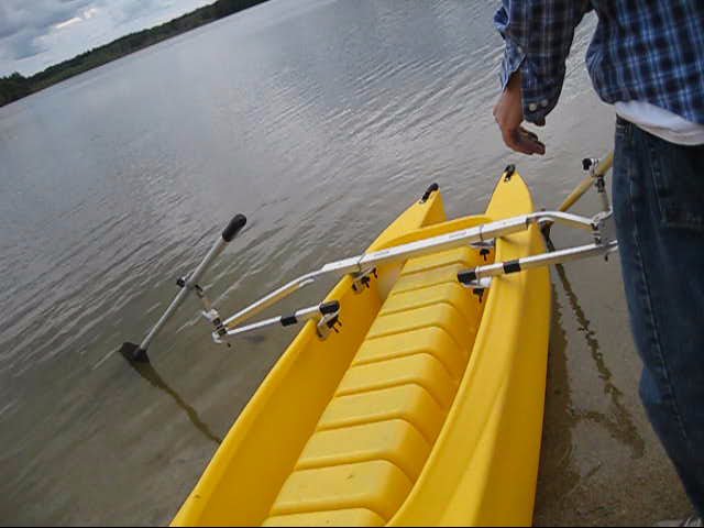 Kayak outfitted with a pair of rowing oars