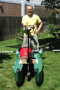 Dan standing in his fishing kayak outfitted with an electric trolling motor